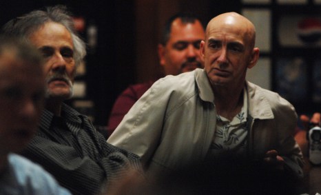 Participants in the Exodus House program listen to a speaker.