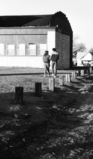 Two Glencoe High School students talk before school starts. Taken in 1988.
